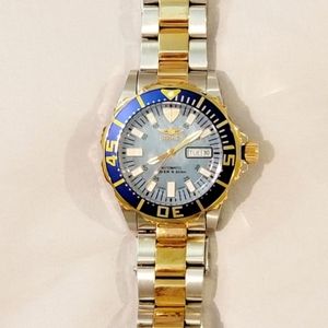 MEN'S INVICTA WATCH...all stainless steel with gold, and blue in color...